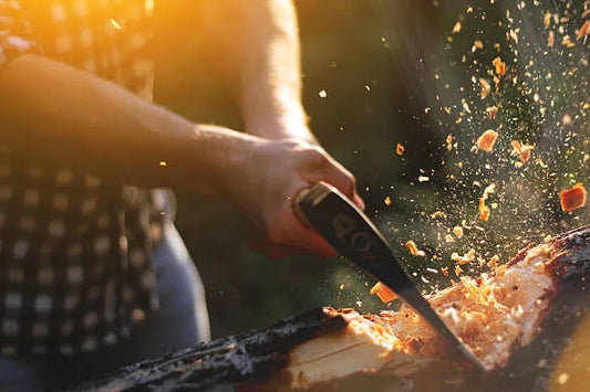 A rugged axe chopping through a log, symbolizing strength, resilience, and the power of natural testosterone optimization.